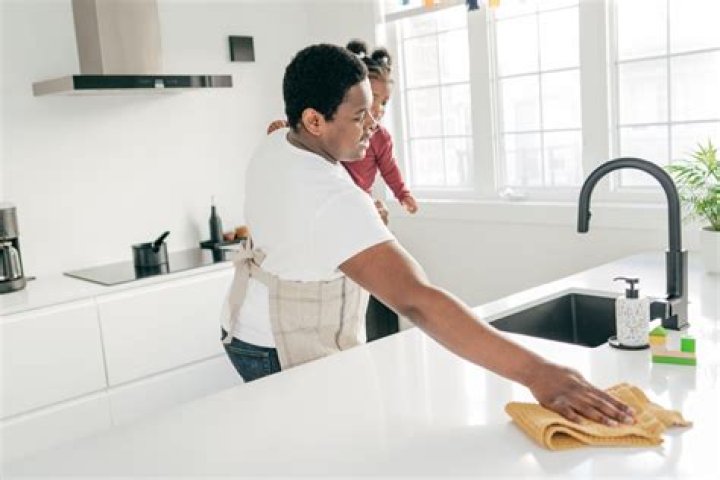 Never Clean Kitchen Counters With a Used Dish Towel, Experts Warn